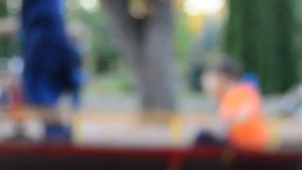 Unfocused View Children Playing Playground — Stock Video