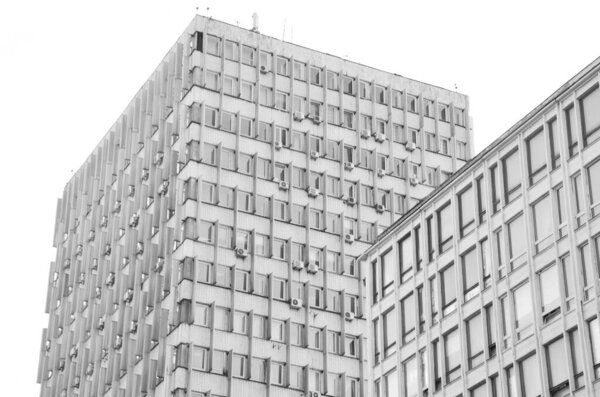 Architectural shot, buildings facades with windows, black and white