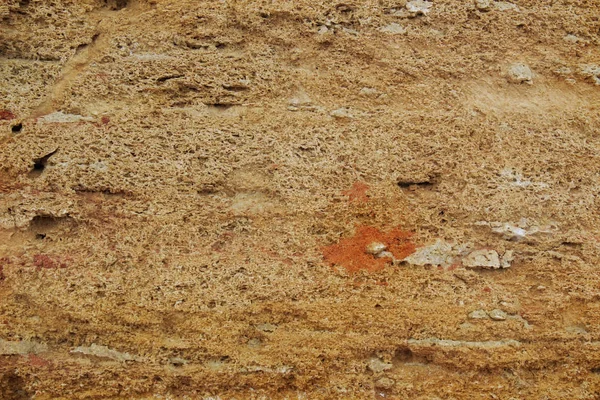 Камень, слои структуры, теплый коричневый, желтый, красный оттенки . — стоковое фото