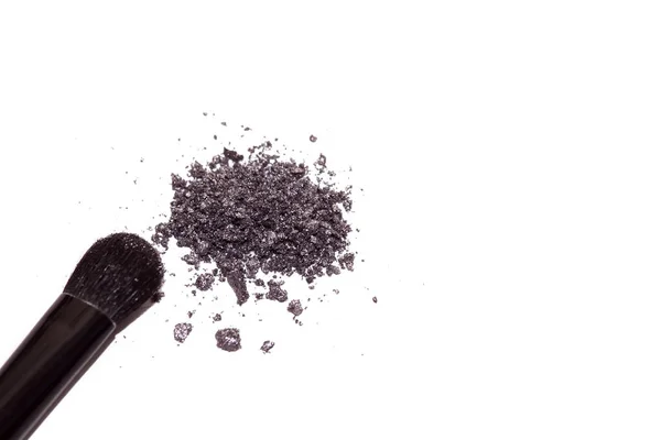 Broken makeup eye shadow isolated on a white background — Stock Photo, Image
