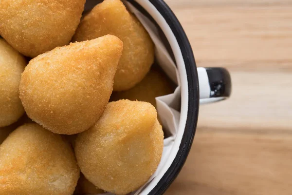 Brazilian savory snacks  Coxinha de frango. Brazilian salgadinho.