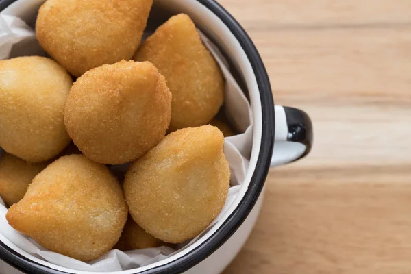 Brazilian savory snacks  Coxinha de frango. Brazilian salgadinho.