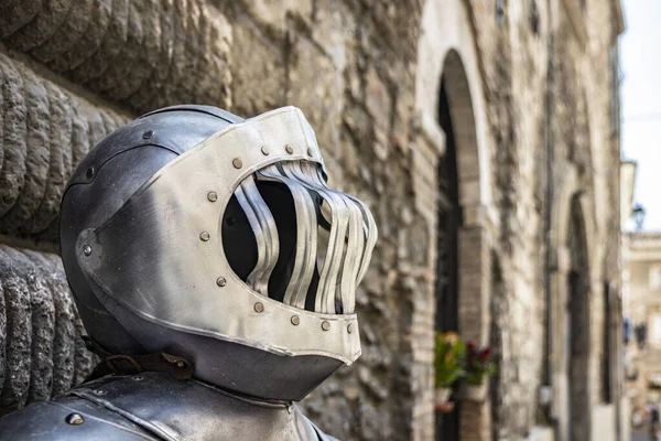 Close up of the helmet of an iron armor in the ancient medieval village of Narni. Umbria, Terni, Italy.