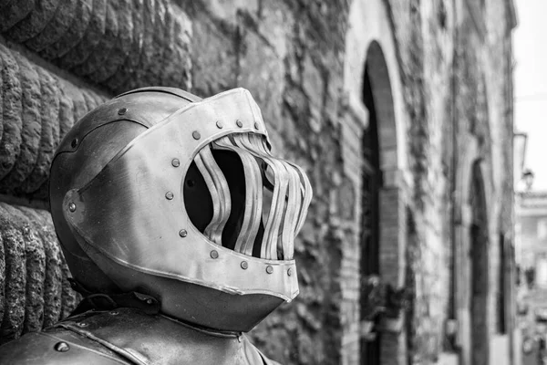Close up of the helmet of an iron armor in the ancient medieval village of Narni. Umbria, Terni, Italy.