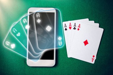 Mobil casino. Poker masası üstünde perde smartphone. Smartphone online casino. Online kumar.