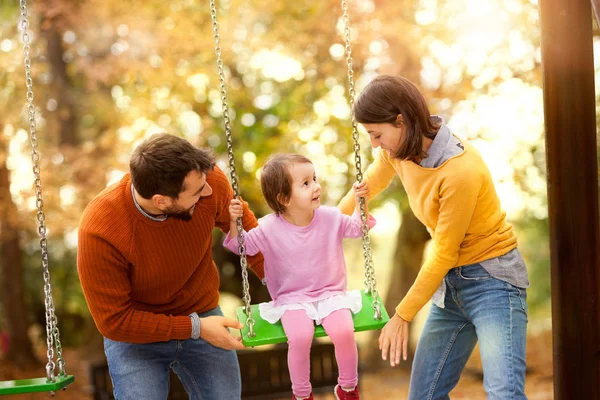 Young Little Girl Having Fun Swing His Mother Father Swinging — Stock Photo, Image