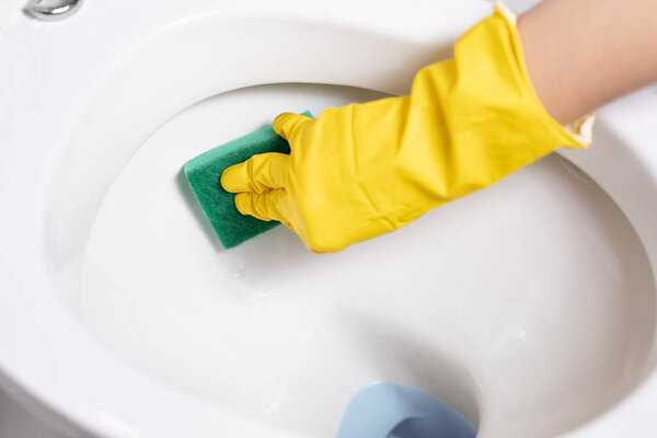 cleaning toilet