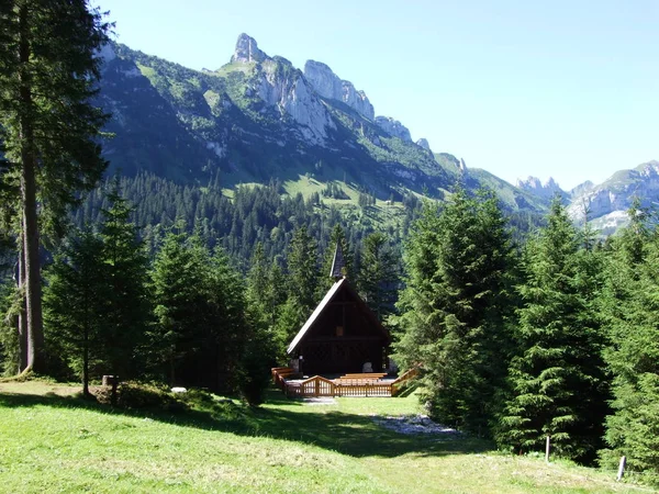 Simple wooden mountain chapel or Bergkapelle Maria Heimsuchung at the Plattenbodeli - Canton of Appenzell Innerrhoden, Switzerland