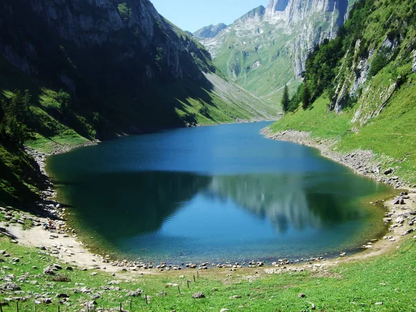 Alpine lake Fahlensee in mountain range Alpstein - Canton of Appenzell Innerrhoden, Switzerland