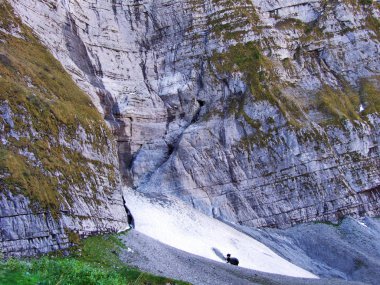 The remains of glacier under the top of Glarnisch by Lake Klontalersee - Canton of Glarus, Switzerland