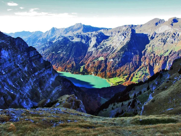Alpine lake Klontalersee in mountain range Glarus Alps - Canton of Glarus, Switzerland