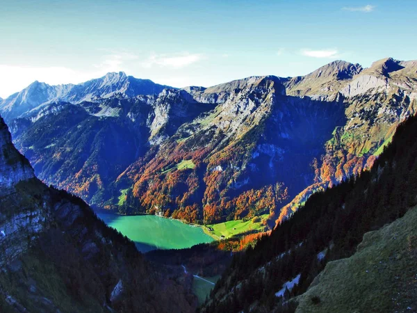 Alpine lake Klontalersee in mountain range Glarus Alps - Canton of Glarus, Switzerland