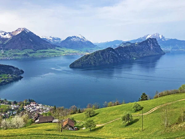 Isolated mountain Buergenberg or Burgenberg and the top of Buergenstock or Burgenstock surrounded by the Lucerne lake - Canton of Lucerne, Switzerland