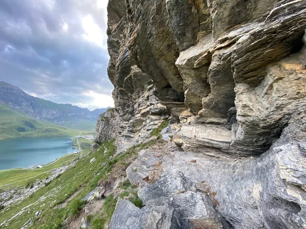 Alpine climbing rocks between the alpine lakes Melchsee (or Melch lake) and Tannensee (or Tannen lake) in the Uri Alps mountain massif, Melchtal - Canton of Obwald, Switzerland (Kanton Obwalden, Schweiz)