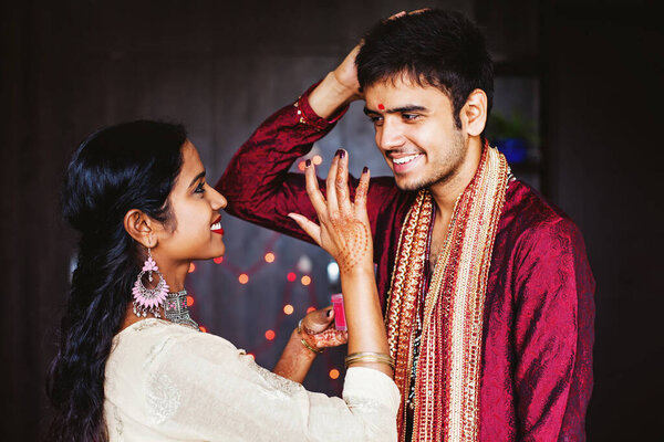 Indian Woman Giving Blessings Man Putting Tika His Forehead While Stock Photo