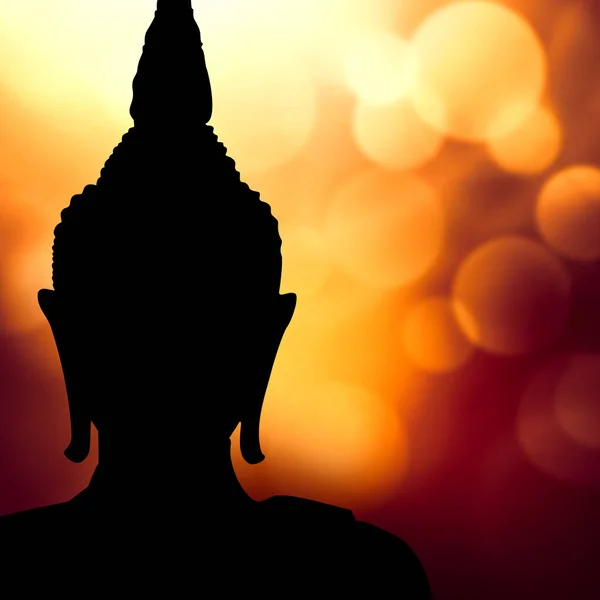 Silueta Cara Buda Contra Luces Mágicas — Foto de Stock