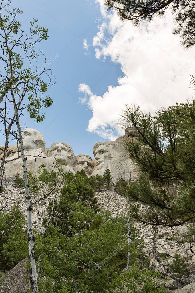 Mount Rushmore National Memorial, showing the full size of the mountain and the scree of rocks from the sculpting and construction, South Dakota, Black Hills, USA