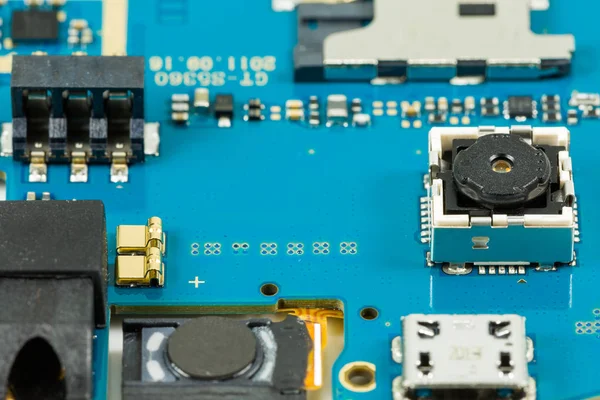 blue smartphone circuit board showing integrated camera
