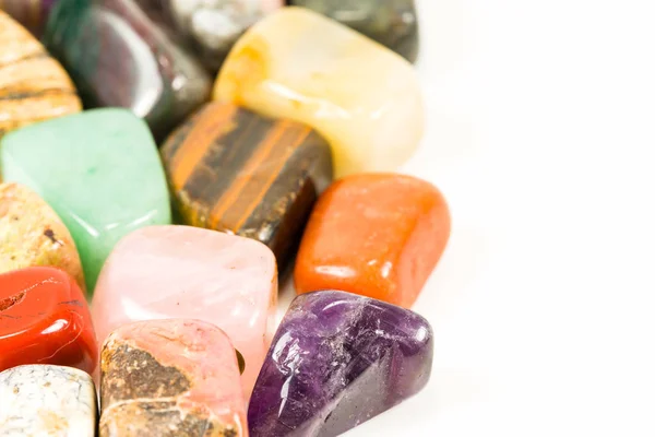 tumbled stones for crystal therapy treatments and reiki with copy space