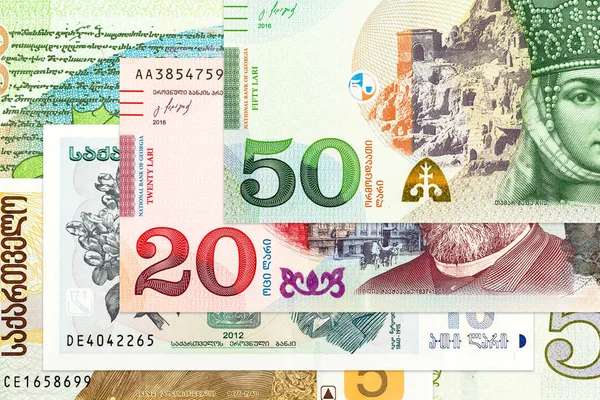 グルジア ラリ銀行ノートの背景のヒープ — ストック写真
