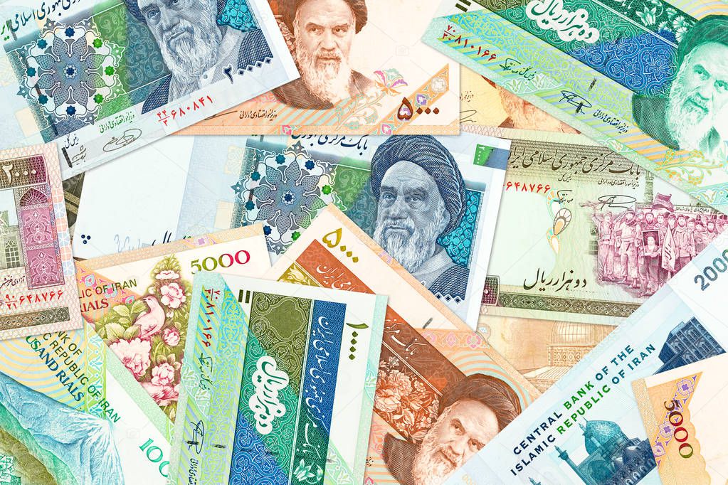 a lot of iranian rial bank notes