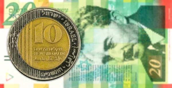 10 shekel coin against 20 israeli new shekel bank note obverse