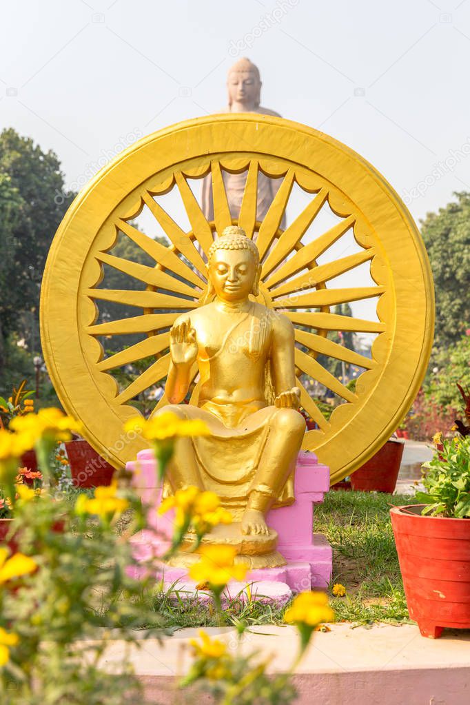 sculpture of Buddha next to Wat Thai Sarnath Temple in Sarnath, Varanasi, Uttar Pradesh, India