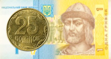 25 Ukraynalı kopiyka jeton 1 Ukrayna hryvnia banknot karşı