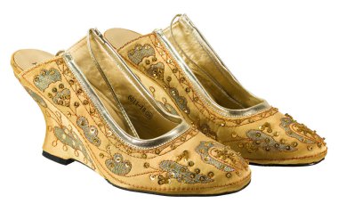 bir çift Altın Ayakkabı zengin izole üzerinde beyaz arka plan payetli