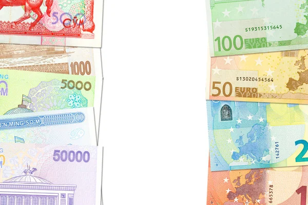 Certains billets en ouzbek Som et billets en euros indiquant une — Photo