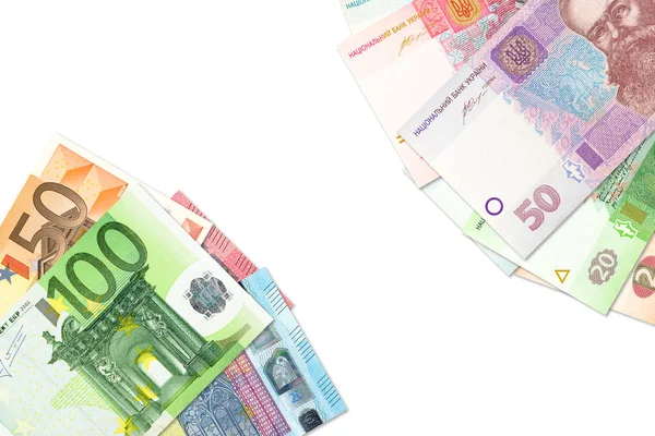 Sommige Oekraïense Hryvnia-bankbiljetten en eurobankbiljetten die b aanduiden — Stockfoto