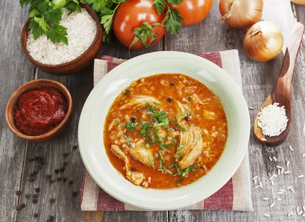 Traditional georgian soup kharcho in a plate on the table — Stock Photo, Image