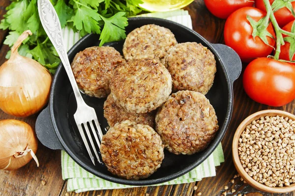 Buckwheat  burgers on the pan — Stock Photo, Image
