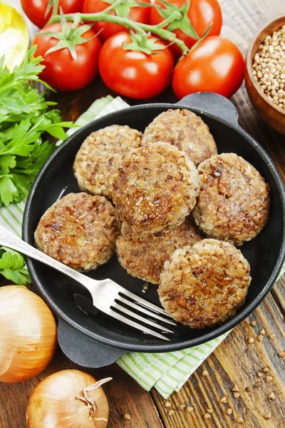 Buckwheat  burgers on the pan — Stock Photo, Image