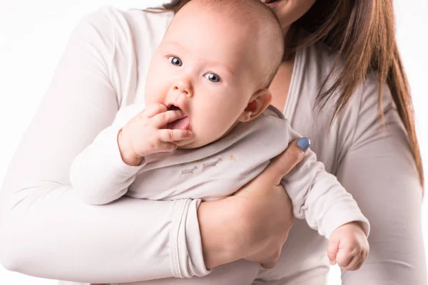 Happy mother with newborn daughter on hands — Stock Photo, Image