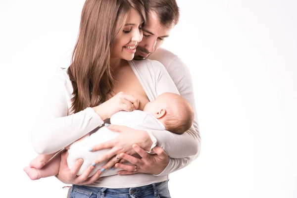 Nursing mother and father are holding a newborn daughter — Stock Photo, Image