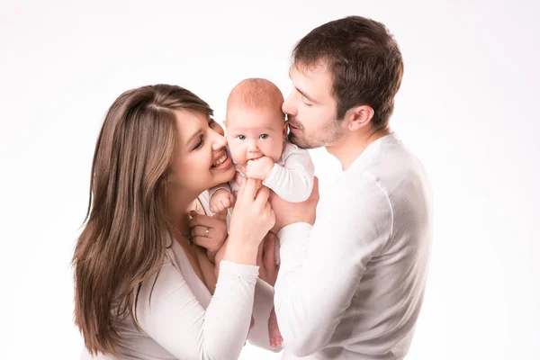 Happy family with newborn daughter in hands — Stock Photo, Image