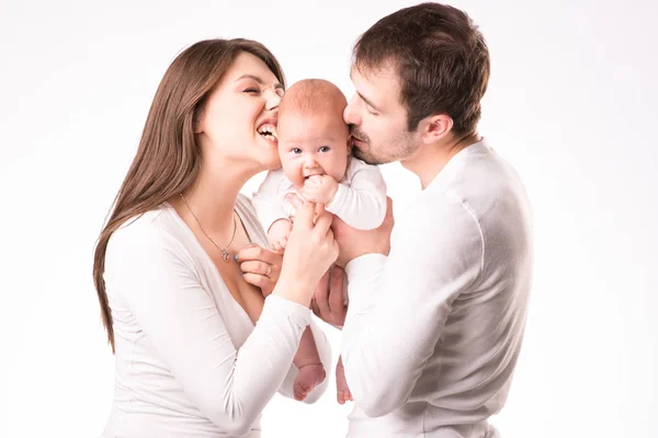 Happy family with newborn daughter in hands — Stock Photo, Image