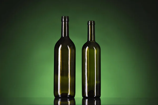 bottles on a green background