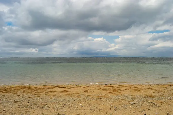 stock image Landscape of Bali beach in a cloudy day