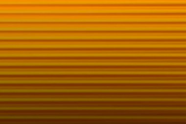 Soyut bulanık arka plan. Altın çizgiler ve kıvrımlar. Çizgili desen.