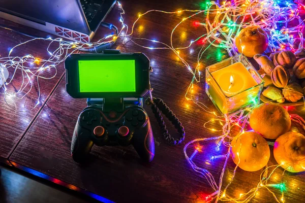 Juego Almohadilla Con Teléfono Inteligente Mesa Fondo Negro Con Luces —  Fotos de Stock