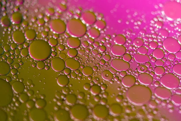 Closeup Oil Droplets Water Surface Colored Background — Stock Photo, Image