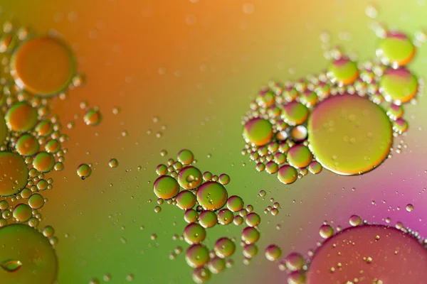 Closeup Oil Droplets Water Surface Colored Background — Stock Photo, Image