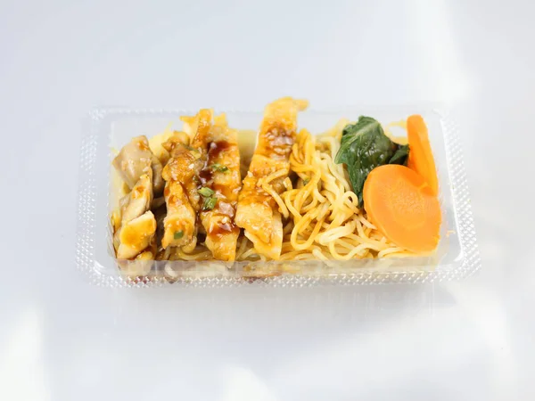 This image shows a Teriyaki Noodle Bento Box or similar Japanese-inspired meal.