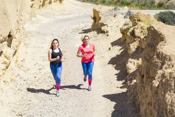 Two Athletics Woman Running Outdoors