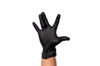 Siyah lateks eldiven erkek elinde. Beyaz arka plan üzerinde yalıtmak. Bir restoran veya bir doktor bir aşçı iş kavramı