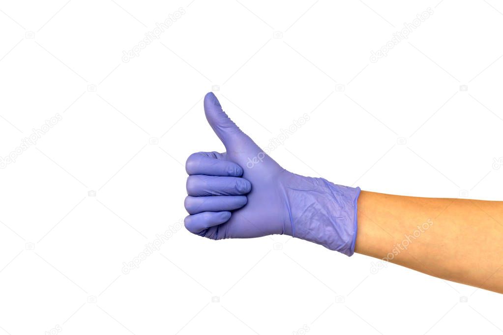 Isolate hand in a lilac rubber glove on a white background. Gesture thumb up or like. Concept of successful work of a chef of a surgeon or cleaning