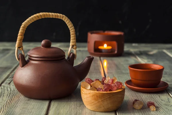 Tea ceremony, tea drinking with pottery. The concept of a cozy evening in a family restaurant