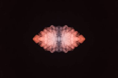 Soyut kalın renkli duman turuncu ve pembe renkli bir canavar yüz siyah bir zemin üzerine. Bir ışık lazer gösterisi bir müzikal konser ve bir T-shirt üzerinde bir parmak izi kavramı